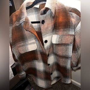 Brown Houndstooth pattern jacket. 100% polyester